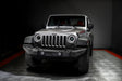 Front view of a Jeep Wrangler JK with 7" Oculus Headlights installed, with white halos on.