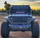 Front end of a Jeep Wrangler with Oculus Headlights installed.