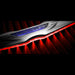 Close-up of Gen II Chrysler Illuminated LED Rear Wing Emblem with red LEDs.