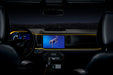 View of a Ford Bronco dashboard from the backseat, with yellow fiber optic lighting installed.