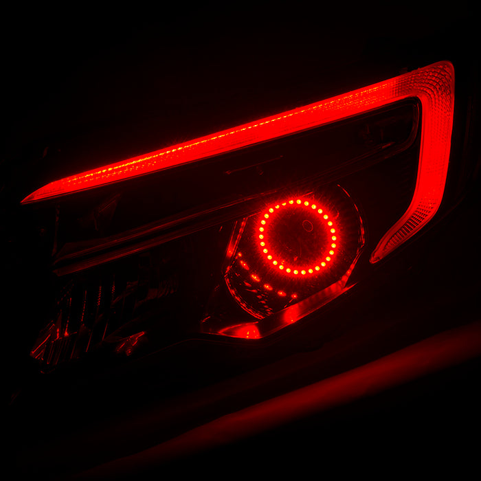 Honda Ridgeline headlight with red halo and DRL.