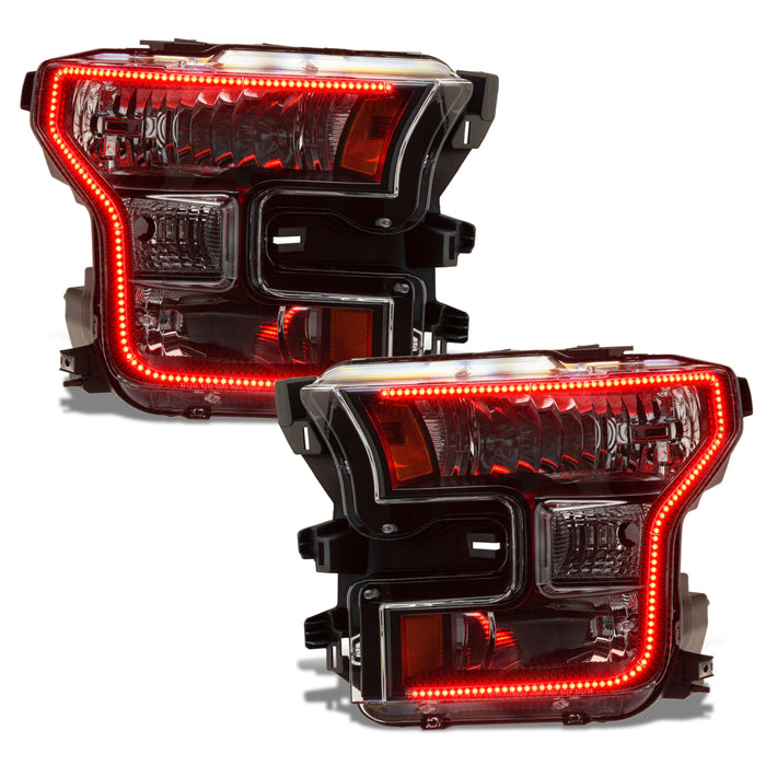 Ford F-150 headlights with red halos.