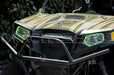 Front end of a Polaris RZR with green headlight halos installed.