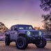 Three quarters view of a Jeep Gladiator JT with bright Oculus LED Headlights installed.