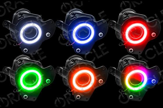 Grid view of Can-Am Spyder headlights showing different color LED halo rings.