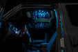 Jeep interior with StarLINER Fiber Optic Hardtop Headliner installed on the roof panels, set to cyan LEDs.