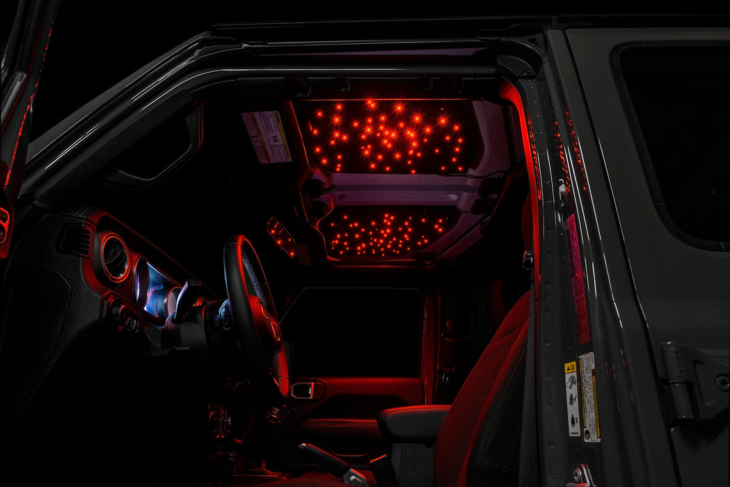 Jeep interior with StarLINER Fiber Optic Hardtop Headliner installed on the roof panels, set to red LEDs.