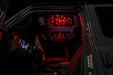 Jeep interior with StarLINER Fiber Optic Hardtop Headliner installed on the roof panels, set to red LEDs.