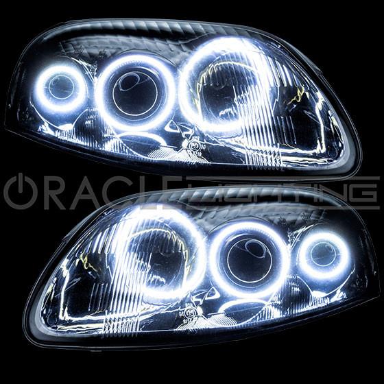 Toyota Supra headlights with white LED halo rings.