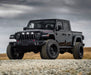 Lifestyle image of a Jeep Gladiator JT with white Pre-Runner Style LED Grill Light Kit installed.
