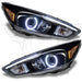 Ford Focus headlights with white halo rings.