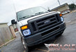 Front end of a Ford Van with Sealed Beam 7x6 H6054 Headlight with Pre-Installed SMD Halo installed, and white halos on.