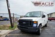 Front end of a Ford Van with Sealed Beam 7x6 H6054 Headlight with Pre-Installed SMD Halo installed, and white halos on.