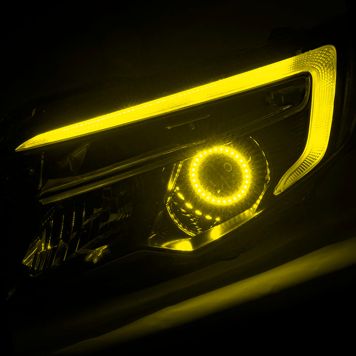 Honda Ridgeline headlight with yellow halo and DRL.